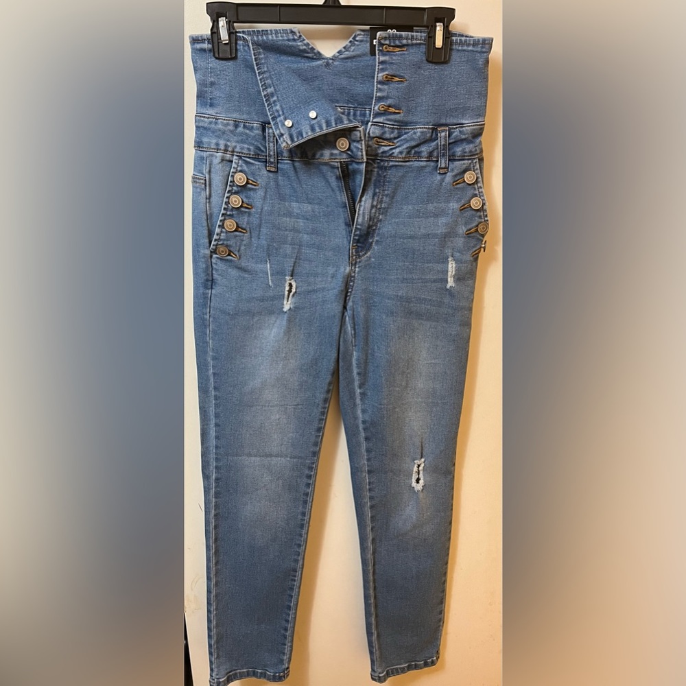 Womens distressed light blue skinny jeans fit size 28 Never worn. Good condition